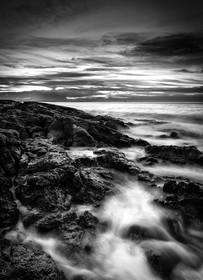 Bamburgh Rocks black & white sunset